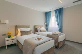 Отель New Era Hotel Бухарест Двухместный номер Делюкс с 2 отдельными кроватями-1