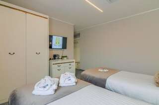 Отель New Era Hotel Бухарест Двухместный номер Делюкс с 2 отдельными кроватями-3
