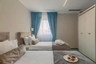 Отель New Era Hotel Бухарест Двухместный номер Делюкс с 2 отдельными кроватями-5