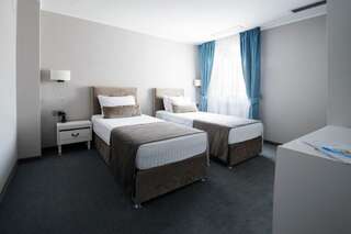 Отель New Era Hotel Бухарест Двухместный номер Делюкс с 2 отдельными кроватями-8